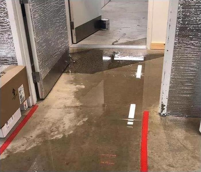 flooded commercial space after storm runoff